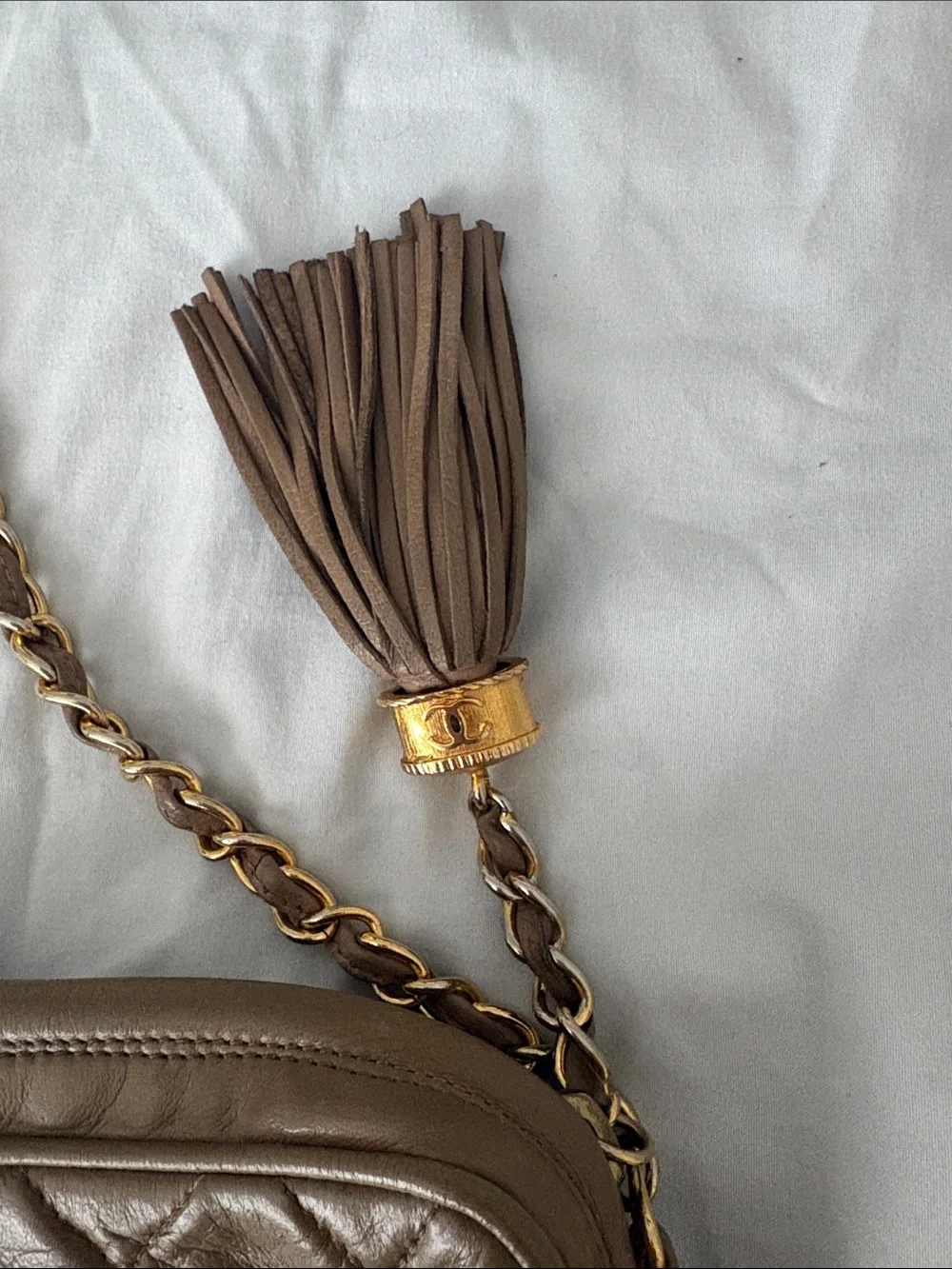 CHANEL Quilted Brown Leather Shoulder Bag with Gold-Tone Chain & Tassel